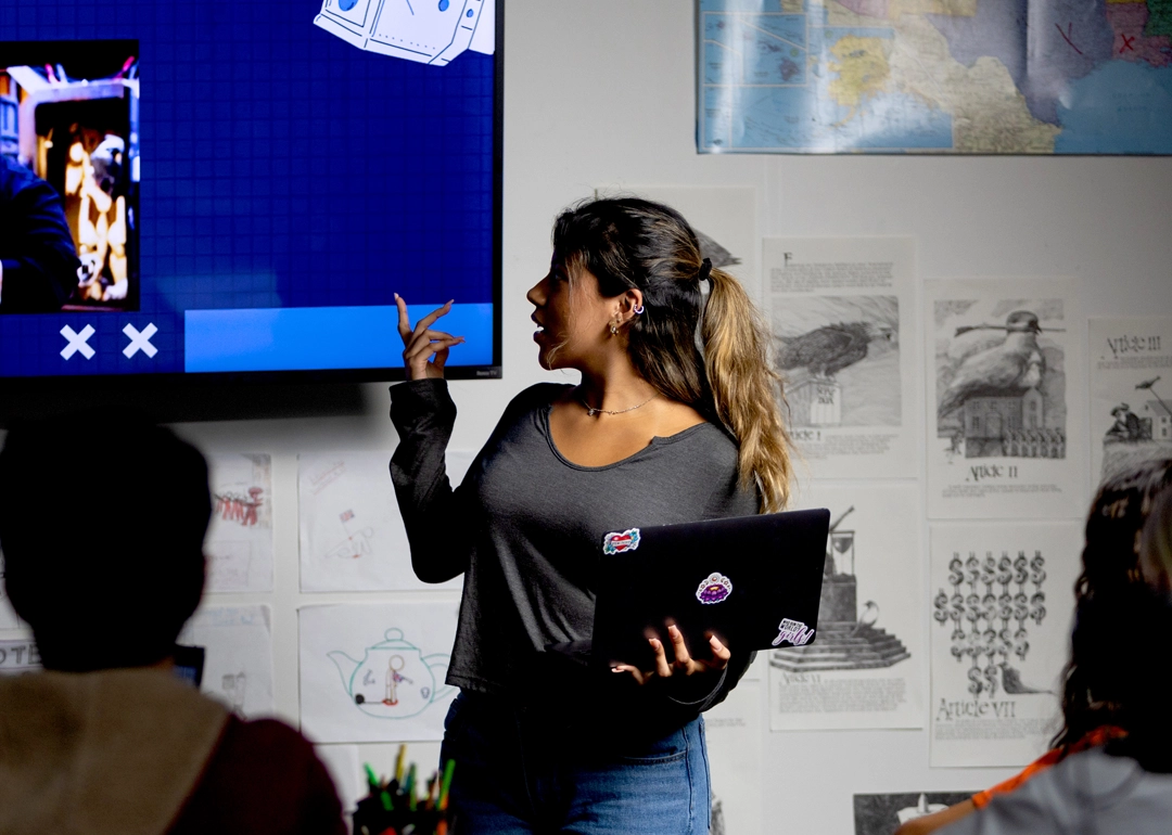 Student giving a presentation to her classmates.