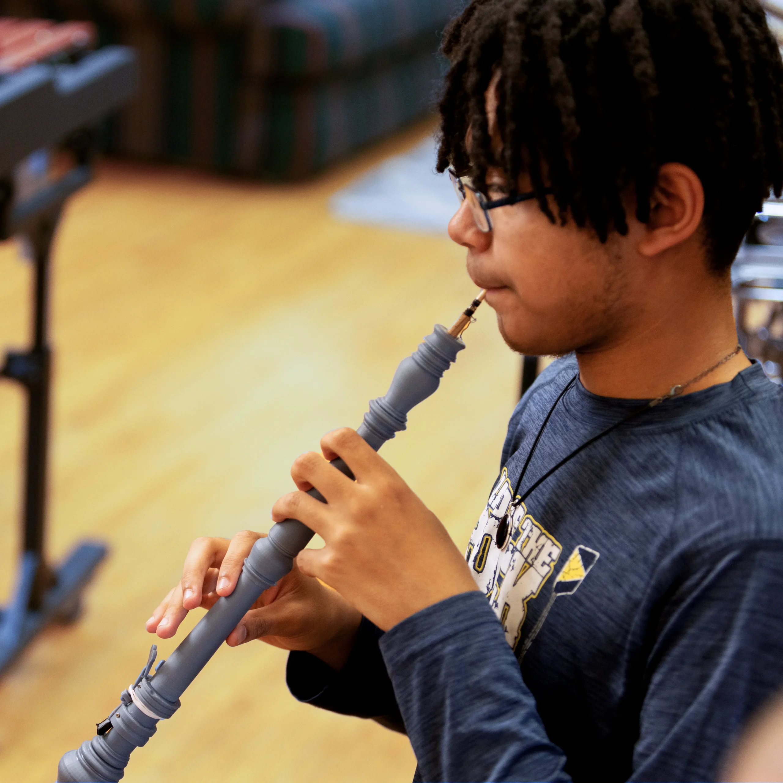 Student in music class